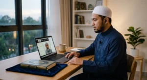 Adult man attending a Quran class to learn Tajweed online for adults with a teacher on video call